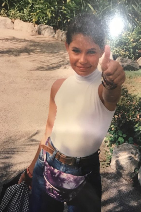 Camilla, aged 10, in baggy jeans and a bumbag.
