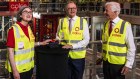 Leah Weckert, Anthony Albanese and Coles chairman James Graham in Kemps Creek on Tuesday.