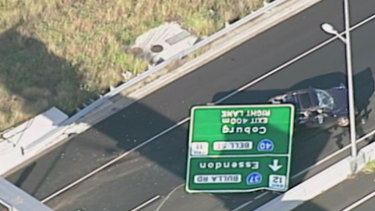 The crumpled sign on the Tullamarine Freeway. 