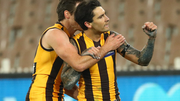 Chad Wingard celebrates a goal during Hawthorn's big win over Richmond.