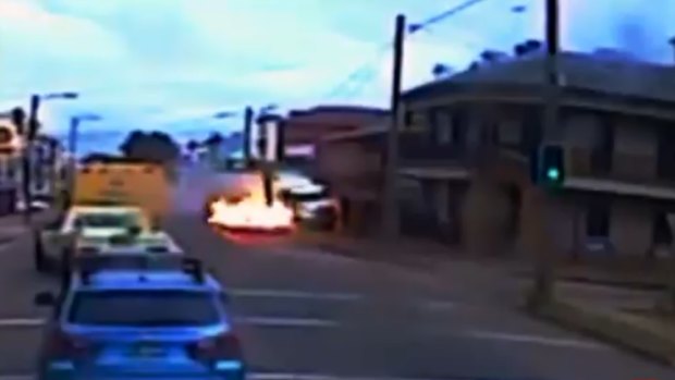 Truck bursts into flames as it hurtles out of control into buildings along the main street of Singleton, NSW, in October 2017. 