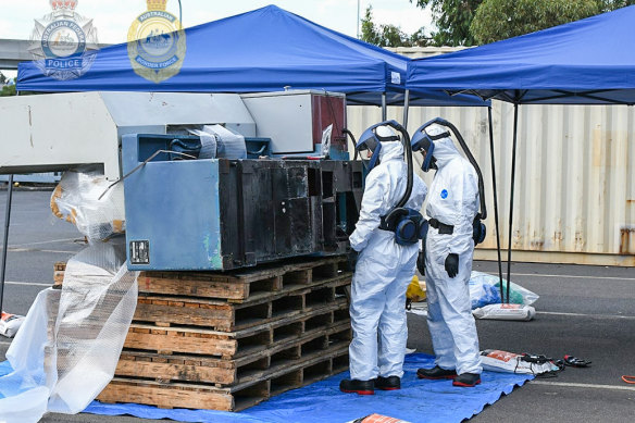 The shipment is inspected by forensic officeers.