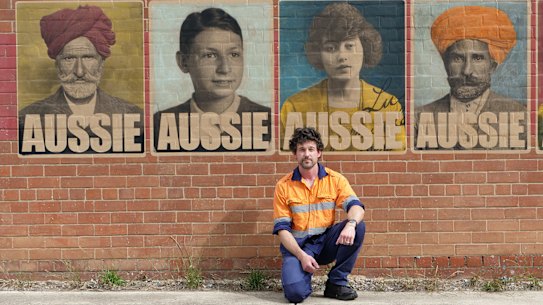 Artist Peter Drew in November with his “Aussie” posters, which have been appropriated by a copycat.