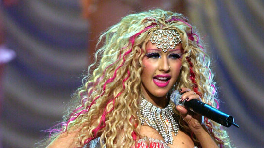 Christina Aguilera sings “Lady Marmalade” from the film “Moulin Rouge,” at the 2001 MTV Movie Awards in Los Angeles, Saturday, June 2, 2001.  The winners for the awards show, scheduled to air June 7, were chosen through a national poll of MTV viewers. (AP Photo/Mark J. Terrill)