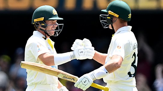 Marcus Harris of Australia and Marnus Labuschagne celebrate Australia’s nine-wicket win.