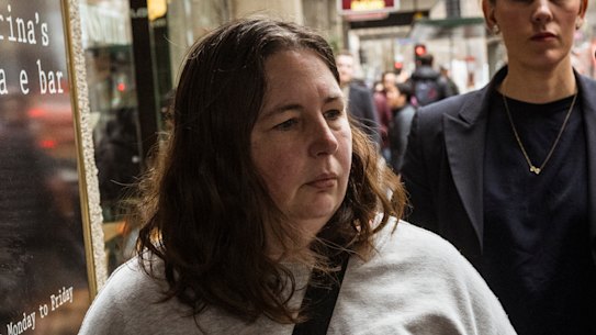 Patterson flanked by her lawyers in Melbourne’s legal district.