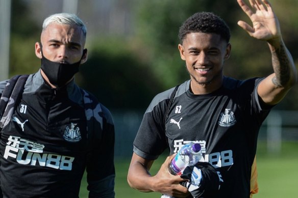 Florent Indalecio with Newcastle youngster Adam Wilson at training.
