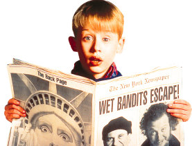 Macaulay Culkin in the Christmas movie <i>Home Alone</i>.