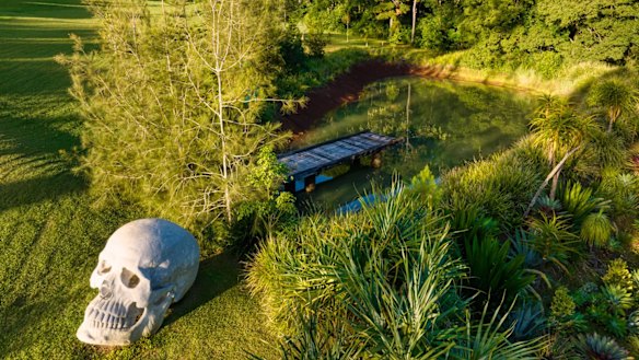 Gallery owners Sean Bassett and Victoria Polasek have put their eclectic Possum Creek mansion on the market.