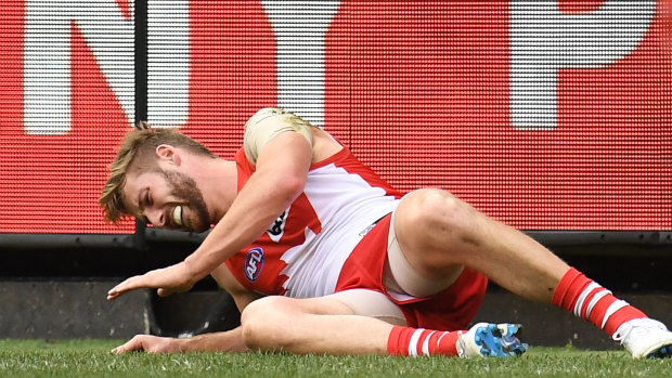 Luckless: Alex Johnson suffered another serious knee injury in his second game back for the Swans.