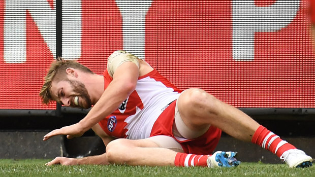 Luckless: Alex Johnson suffered another serious knee injury on his return for the Swans.