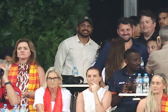 Rioli (centre) watched on at TIO Stadium in Darwin as the Suns took on the Hawks.