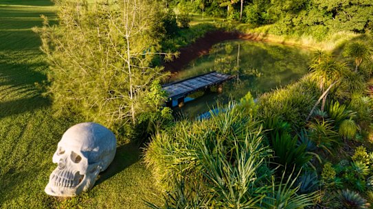 Gallery owners Sean Bassett and Victoria Polasek have put their eclectic Possum Creek mansion on the market with a guide of $15.5 million. 