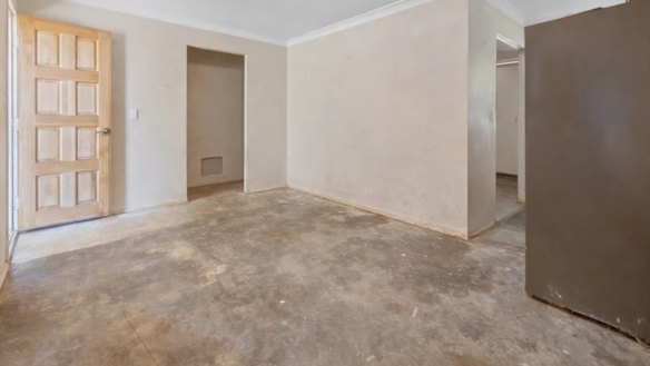 The investor who won the auction admitted it was the worst house on the best street.