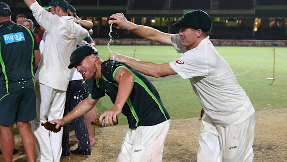 More beer ... Chris Rogers pours a VB on David Warner at the SCG in 2014.