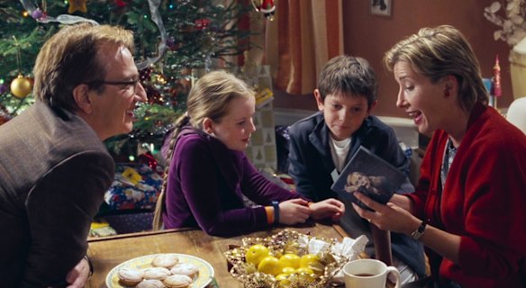 Emma Thompson as Karen and Alan Rickman as Harry in Love Actually.