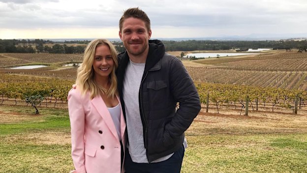 Chris Lawrence with his wife Kathryn during a private getaway before he returned to the football field after his injury.
