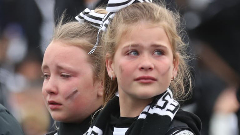 Young Pies react to the loss at the Holden Centre.