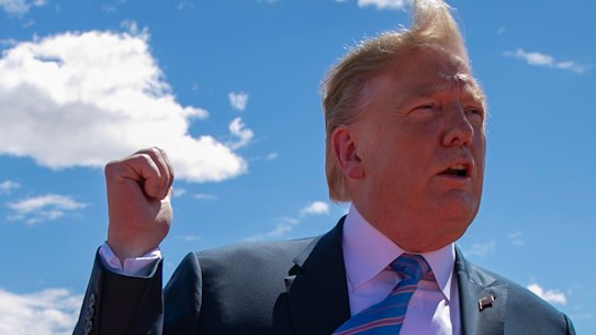 Trump speaks at a new section of the border wall with Mexico on April 5.