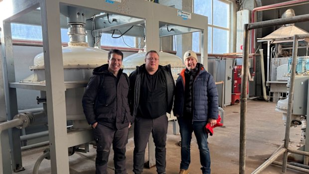 Lindian executive chairman Robert Martin and executive director Zac Komur with Vladimir Fedotov at the SARECO plant in Kazakhstan.