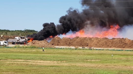 Caravans destroyed and mulch machine on fire as crews battle blazes