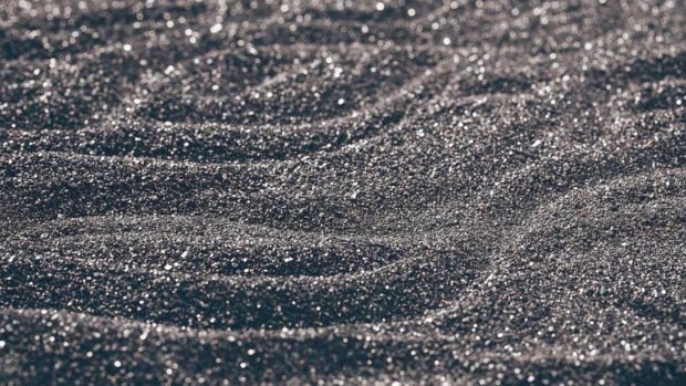 Titanium rich ilmenite sand the dominant mineral at Marmota’s Muckanippie discovery outside Coober Pedy in South Australia.