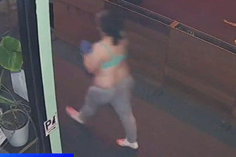 Video Grab of CCTV footage of a woman who was arrested on a tram after two men were stabbed to death in Brunswick.