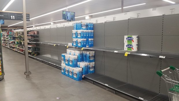Under-stocked toilet paper shelves at Cannon Hill Woolworths on Tuesday.