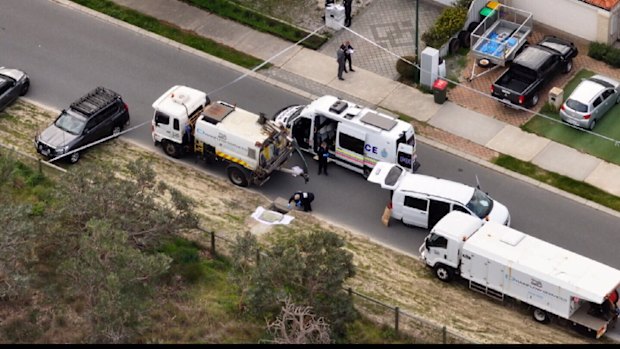 Police at the scene where a baby’s body was found in Alexander Heights on Monday.