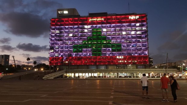 City Hall in Tel Aviv's Rabin Square was lit up in the colours of the Lebanese flag on Wednesday.