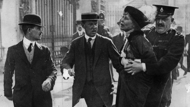 Suffragette leader Emmeline Pankhurst is arrested outside Buckingham Palace in 1914.