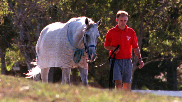 Trainer Tim Donnelly with Quick Flick at Randwick at the height of the flyng grey’s career.