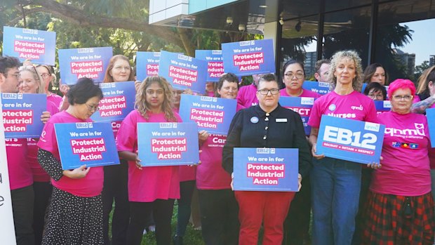 Secretary Sarah Beaman with Queensland Nurses and Midwives Union members in West End on Thursday.