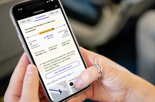 United’s app includes directions to connecting gates with estimated walk times, and informs passengers if the airline can hold the plane for people running late.