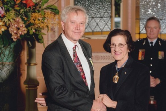 John Anderson with then Governor of NSW Marie Bashir at the investiture ceremony to mark the PSM award.
