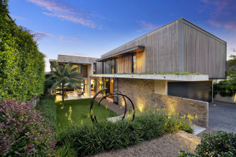 The Mosman residence of Steve Bellotti was designed by architect Shaun Lockyer and built from concrete, stone, timber and steel.