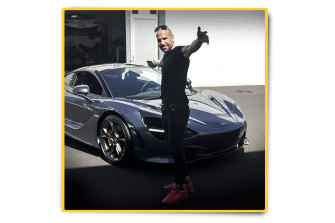 D'Amore and one of his luxury cars, a McLaren, shortly after purchase. 