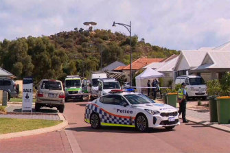 Police at a Madora Bay home on Wednesday investigating the death of the 14-month-old boy.