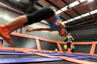 People enjoy the Sky Zone in Alexandria.  It has been closed during Sydney's COVID-19 lockdown and will not reopen. 