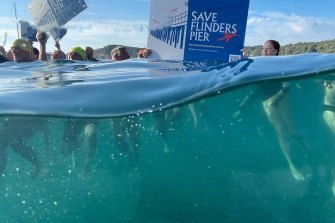The Flinders Icebergers joined in to support saving the pier 