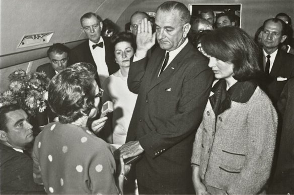 Vice president Lyndon Johnson is sworn in as president flanked by his predecessor’s widow Jackie Kennedy in November 1963. The killing gave fresh impetus to the need for constitutional clarity.