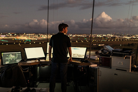 Air-traffic controller Alexander Palmer in the tower at Melbourne Airport. 