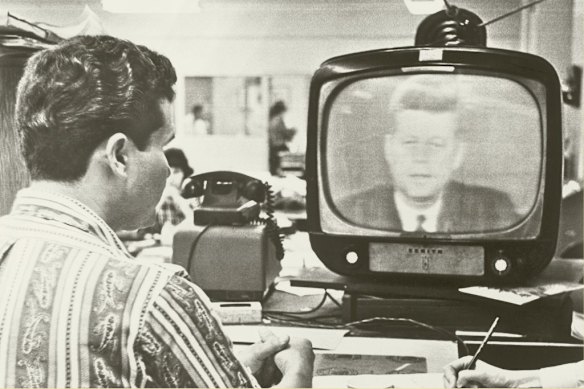 A MIami Cuban watches President John F. Kennedy address Americans during the Cuban Missile Crisis in 1962.