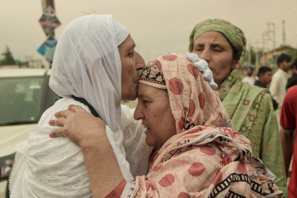 A Kashmiri pilgrim is embraced by her relative in Srinagar, in Jammu and Kashmir, in May before departing for Saudi Arabia for the Haj.