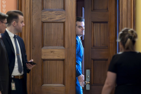 Matt Gaetz closes a door to a private meeting with Vice President-elect J.D. Vance and Republican Senate Judiciary Committee members, at the Capitol in Washington, before his withdrawal. 
