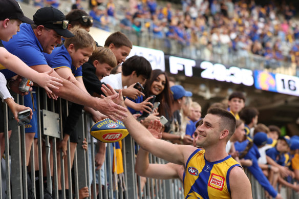 Elliot Yeo celebrates with supporters.