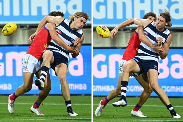 Geelong’s Mark Blicavs tackles Lion Zac Bailey,