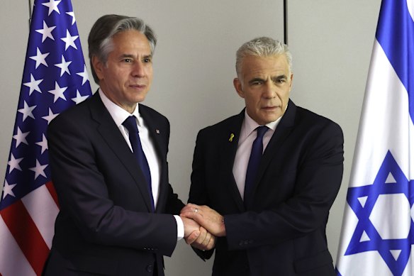 US Secretary of State Antony Blinken (left) with Israeli opposition leader Yair Lapid in 2024. 
