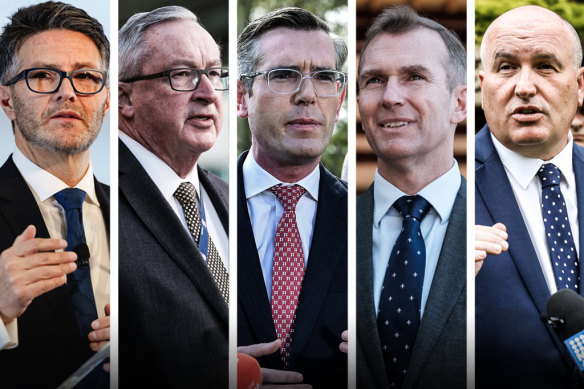 NSW Premier Dominic Perrottet (centre) flanked by ministers not contesting the election (from left) Victor Dominello, Brad Hazzard, Rob Stokes and David Elliott.