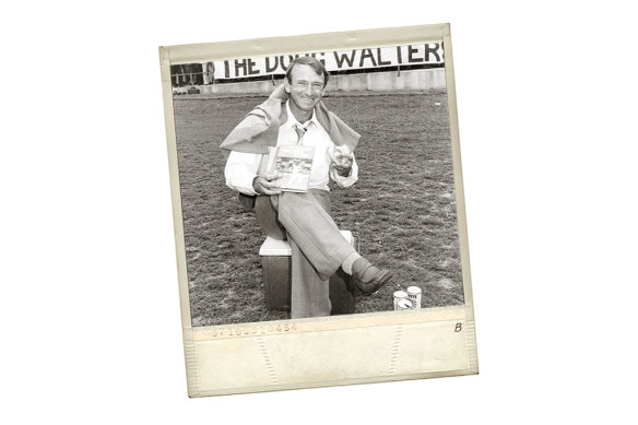 Cricketer Doug Walters eats a pie and sits on an Esky near the Hill at the SCG in 1981 to promote a book, The Doug Walters Story. 